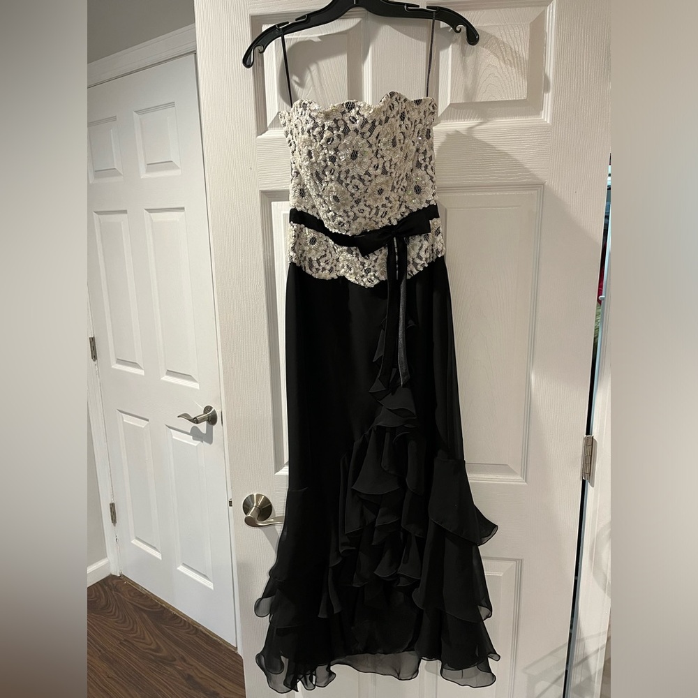Jovani strapless white embroidered flower and black‎ flowy layered.